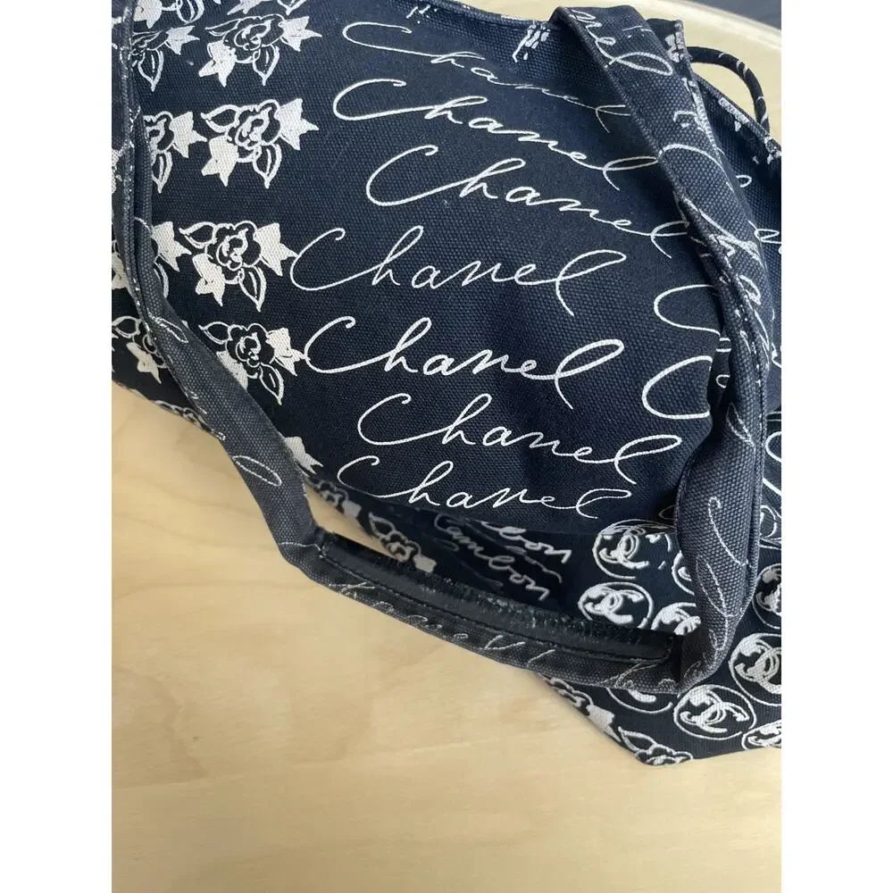 Chanel Graffiti Tote CC Print Camellia Drawstring Bag Black Cambon Mademoiselle